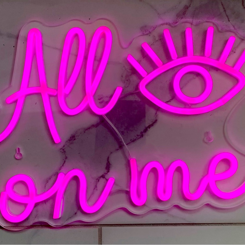 All eyes are on me neon sign